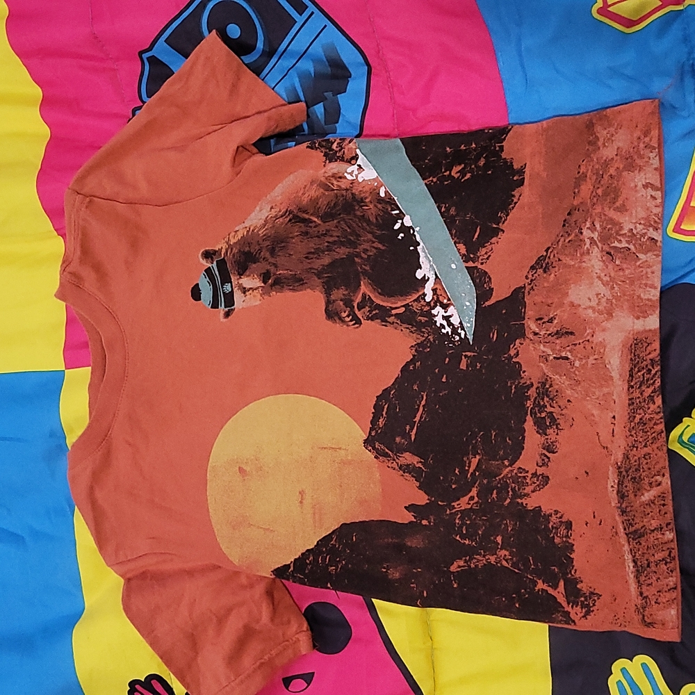 Wonder nation shirt size 4-5 color is a maybe a darker orange or brownish color